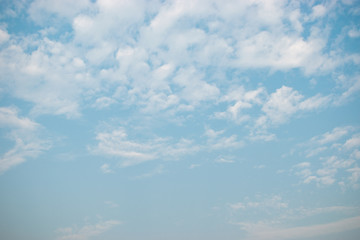 Blue sky with cloud.White fluffy clouds in the blue sky.
