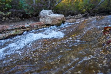 Fototapeta na wymiar Image of a mountain stream in the fall.