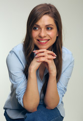 relaxed woman sitting and looking away.