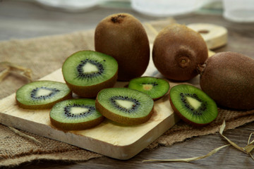 slices of kiwi fruit on cutting board