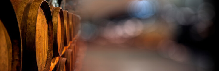 Wine in wooden barrels is stored. Wine cellar