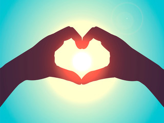 Fototapeta premium Hand in heart form. Love symbol in blue sky.