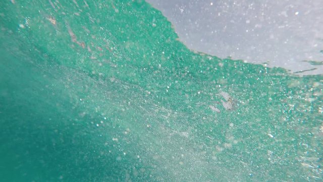 Pov of a person drowning and rotating in the sea
