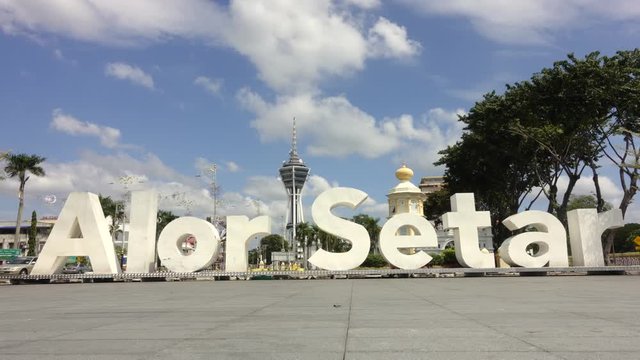 Time lapse: Beautiful sunny and cloudy with Alor Setar Tower landmark at Alor Setar, Kedah, Malaysia. 