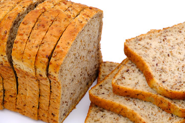 Fresh homemade baked bread and sliced bread isoalted on white background
