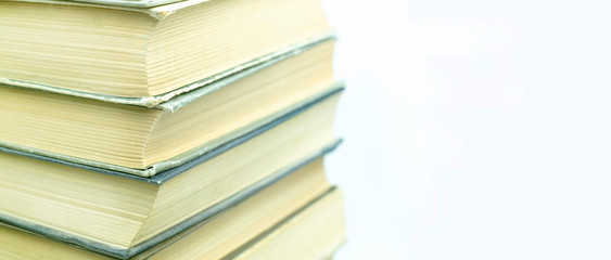 Book pile on light background  Educational concept. 