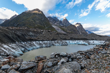 The Miage lake (Lac du Miage)  and Miage glacier at the foot of the Mont Blanc massif, in Val Veny. Italian alps, Aosta Valley, Italy