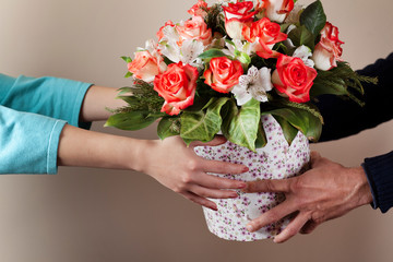 woman and man hand flowers