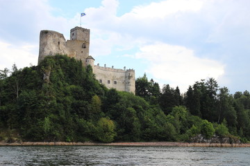 
Castle on a rock by the lake - obrazy, fototapety, plakaty