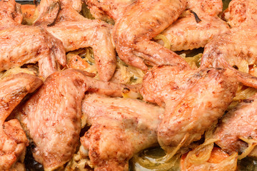 Grilled chicken wings close-up. Culinary recipes for delicious food.