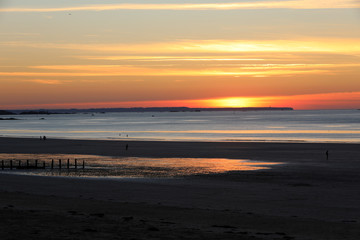 Fototapeta premium Beauty sunset view from beach in Saint Malo, Brittany, France