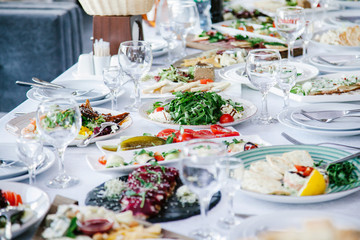 White table with food at a funeral