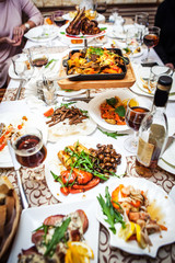 Saturated table with food at the wedding, top view
