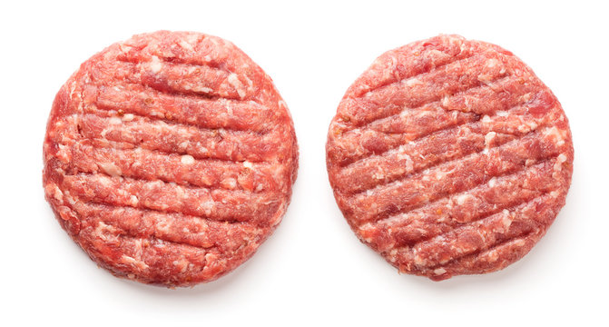 raw minced beef meat for burgers isolated on white background