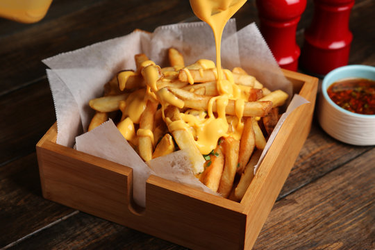 french fries with a cheddar melted cheese