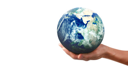Globe , earth in human hand, holding our planet glowing.  image provided by Nasa