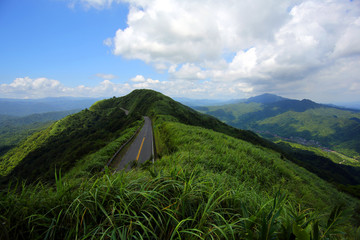 A winding road in the mountains of northern Taiwan, she has a beautiful name, and travelers call her: Lonely Highway