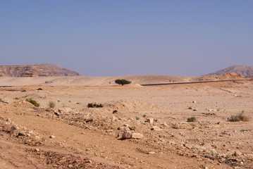 Beautiful panorama of the Sinai Desert. Mountains and sands of different shades. Clear blue sky
