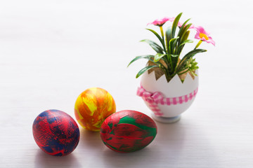 Holidays, traditions and Easter concept - Multi-colored decorative colourful eggs.