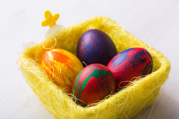 Holidays, traditions and Easter concept - Multi-colored decorative colourful eggs.