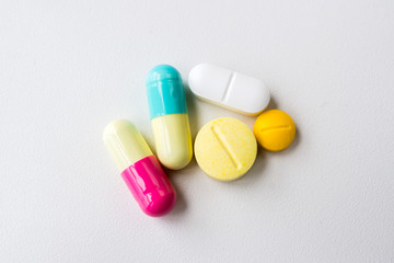 Medicines, capsules, tablets and pills isolated on white background