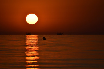 Riccione, fishing boats at dawn in the Adriatic sea
