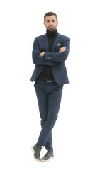 in full growth. confident modern man in business clothes