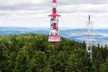 Telecommunication tower with transmitters and aerials, wireless communication and internet traffic...