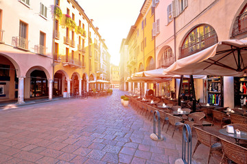 Fototapeta na wymiar Mantova city street sun haze view, UNESCO world heritage site