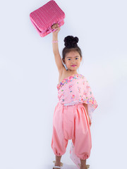 children girl in pink traditional Thai dress with bag for Welcome Songkran Festival on white background