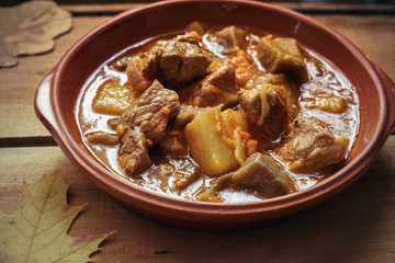 Thick hot soup with potatoes and meat