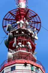 Telecommunication tower with transmitters and aerials, wireless communication and internet traffic...
