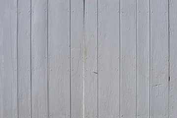 Vintage weathered shabby white painted wood texture as background