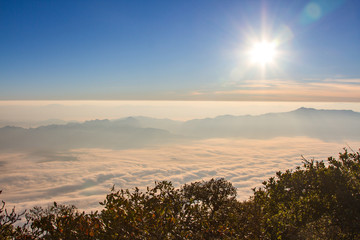 Morning Fog on mountain and sunrise background,Landscape mountain and sunrise background view.