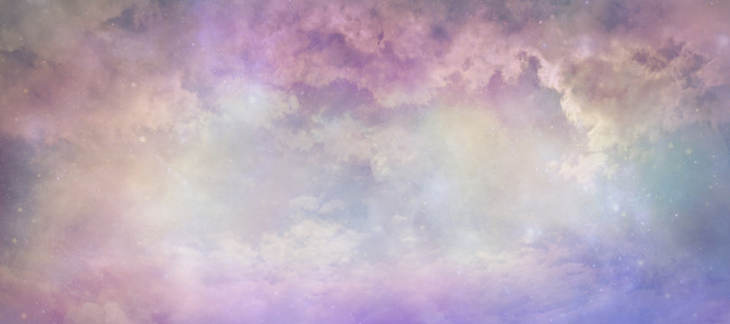 Heavens above celestial concept background banner - beautiful blue pink purple green lilac light filled heavenly ethereal cloud scape depicting the heavens above 
