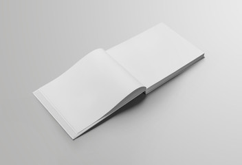 The landscape template of an open book, with flipped pages, with realistic shadows, for presentation of design.