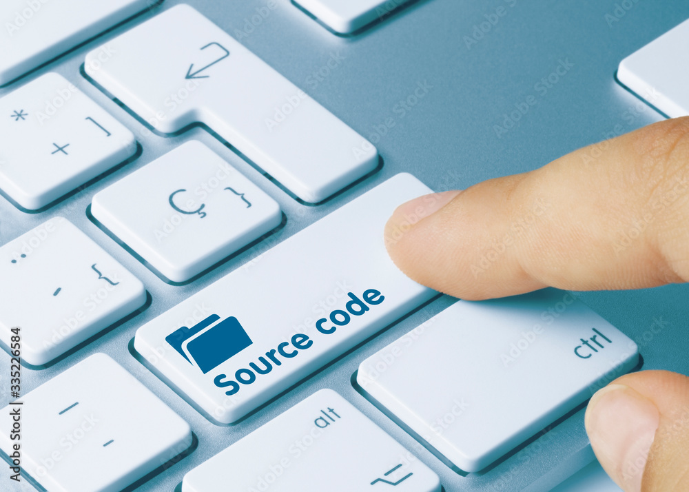Wall mural source code - inscription on blue keyboard key.