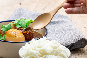 classic Thai food culture concept : jasmine rice ready to serve with spice soya sauce pork and eggs...