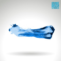 Blue brush stroke and texture. Grunge vector abstract hand - painted element. Underline and border design.
