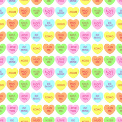Seamless cute colorful vector valentine pattern with pastel candy hearts with text on white background. Gift wrapping paper, interior, cloth, fabric or web design.