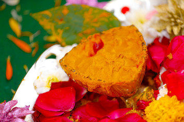 Traditional wedding ceremony in Hinduism: Turmeric in plate for haldi ceremony