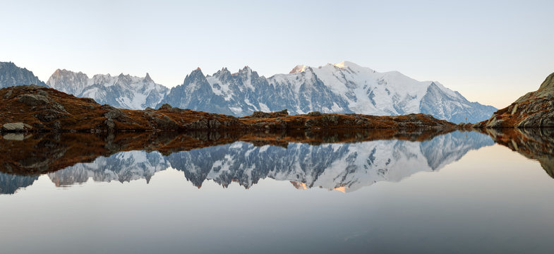 Picturesque panorama of Chesery lake (Lac De Cheserys) and snowy Monte Bianco mountains range on background, Chamonix, France Alps
