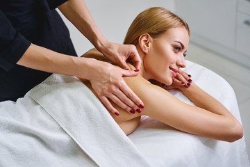 Obraz na płótnie Canvas Body professional is doing massage stock photo