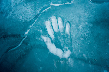hand printed on blue ice background