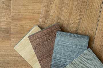 sample stack of sheet vinyl floor type to choose for floor design