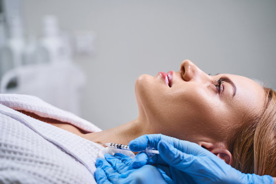 Young pretty woman during mesotherapy stock photo