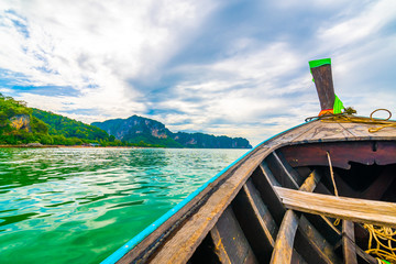 View from long tailed boat in Krabi town, Thailand. Boats are prepared for passenger to famou...