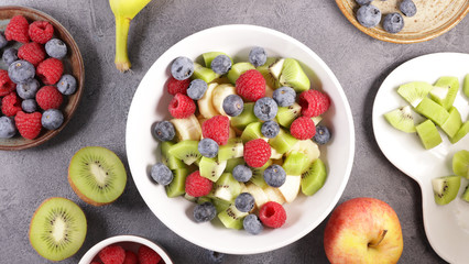 mixed fruit salad with blueberry, raspberry, kiwi and banana