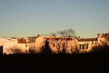 Fototapeta premium Cityscape of apartments in Berlin Kreuzberg as the sunsets Germany