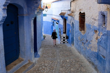 Old blue painted street in city of  Chefchaouen,Morocco.